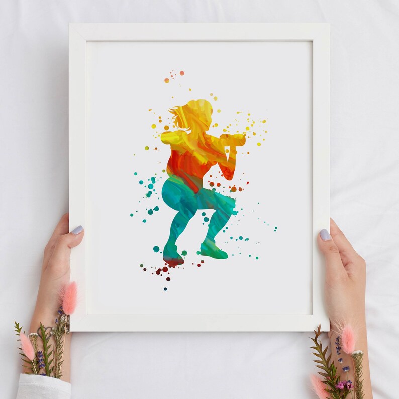May include: A colorful watercolor silhouette of a person holding a camera, with splashes of yellow, orange, red, blue, and green paint.
