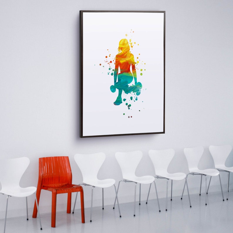 May include: A framed watercolor painting of a woman lifting weights. The woman is silhouetted in a vibrant blue, green, and yellow color scheme. The painting is displayed on a white wall above a row of white chairs.