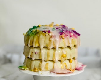 King Cake Scented Candle: Mardi Gras Replica with Baby & Beads