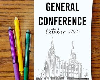 May include: A white booklet with the black text GENERAL CONFERENCE October 2025 and a line drawing of the Brigham City temple, accompanied by three retractable pens in purple, yellow, and teal with clear plastic clips and white erasers.