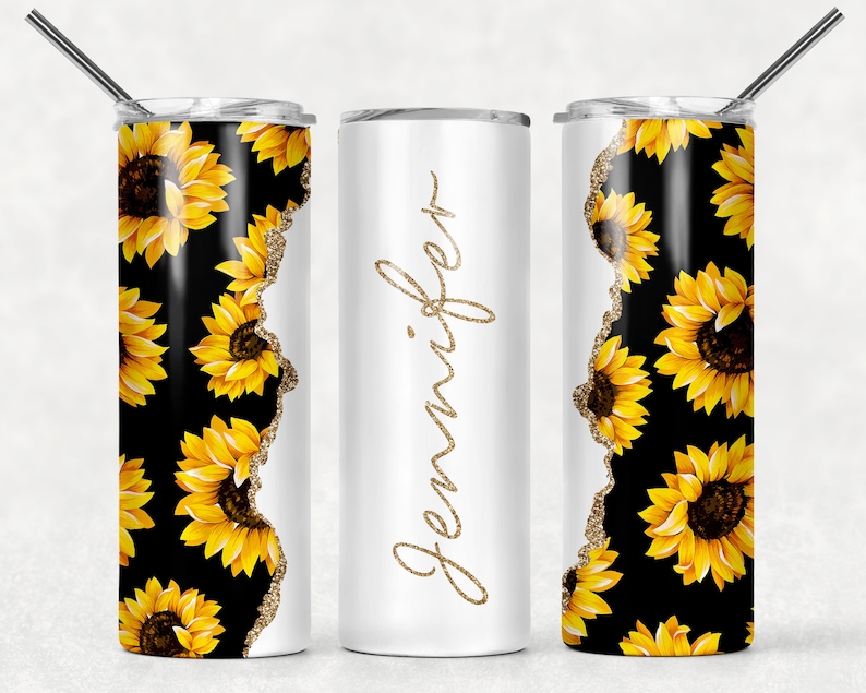 May include: Three stainless steel tumblers with a black and yellow sunflower pattern. The middle tumbler is white with the name "Jennifer" written in gold glitter.