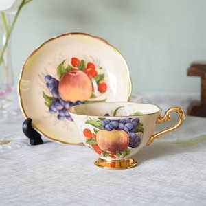 Spode, Royal Worcester Marquis fine china,22 carat gold, Orchard Tea Cup and Saucer,Bone China , Made in England.#2007263