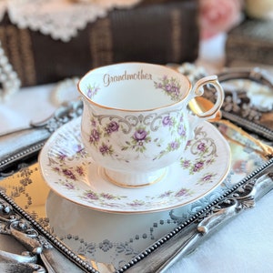 Vintage Queen&#39;s Grandmother art nouveau floral design Fine Bone China Made in England Teacup and Saucer