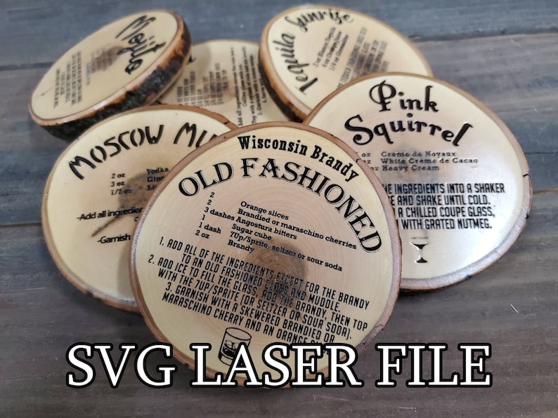 May include: Six wooden coasters with laser-engraved cocktail recipes. The coasters feature recipes for Moscow Mule, Tequila Sunrise, Pink Squirrel, and Old Fashioned. The Old Fashioned recipe includes ingredients like orange slices, brandied cherries, Angostura bitters, sugar, and brandy.