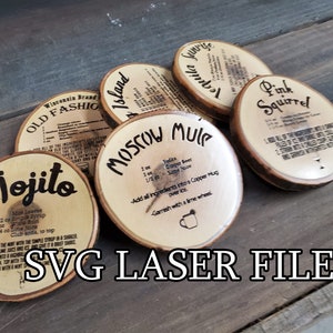 May include: Six wooden coasters with different drink recipes engraved on them. The recipes include: Old Fashioned, Island, Tequila Sunrise, Moscow Mule, Mojito, and Pink Squirrel.