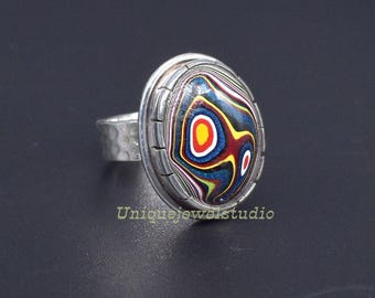 Handgjord Fordite herrring: Färgglada smycken i sterlingsilver