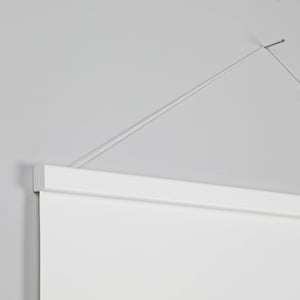 May include: White hanging canvas with a white wooden frame and a thin white string attached to the top.