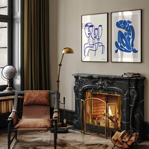 a living room filled with furniture and a fire place