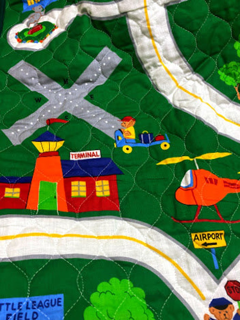 Playful Patches Quilted Blanket NCU0DV485