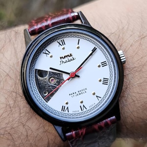 HMT Jhalak Skeleton Watch: Black Case, Roman Numerals, 17 Jewels