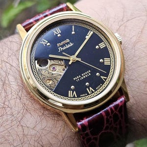 HMT Jhalak Skeleton Watch: Black Dial Roman Numerals, 17 Jewels