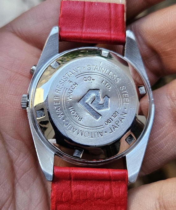 Vintage Ricoh Automatic Watch: Dynamic Wide President Black Dial