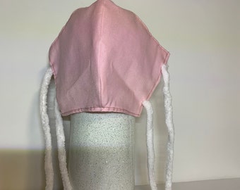 Handmade cotton face masks with pocket for filters suitable for nurses, doctors and the general public.