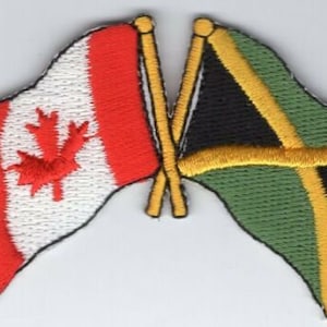 May include: Embroidered patches of the Canadian and Jamaican flags. The Canadian flag is red and white with a maple leaf. The Jamaican flag is green, black, and yellow with a diagonal cross.
