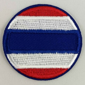May include: A round embroidered patch with the colors of the Thai flag. The patch features red, white, and blue stripes.