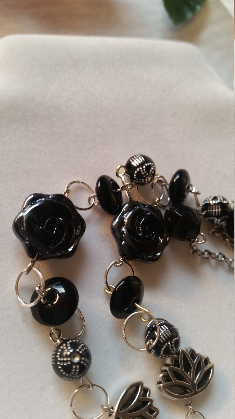 Black stone beaded wire wrapped long necklace with black and clear crystals and silver accents