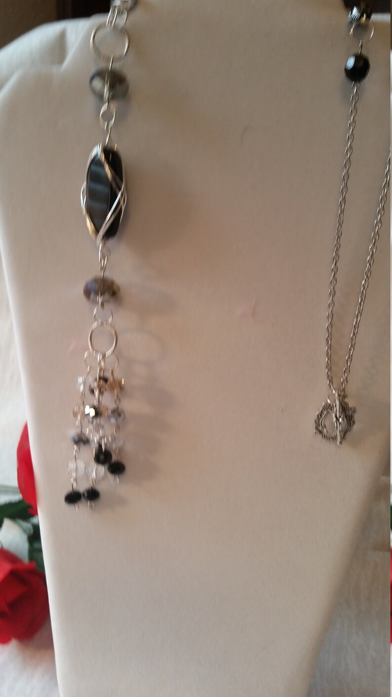 Black stone beaded wire wrapped long necklace with black and clear crystals and silver accents