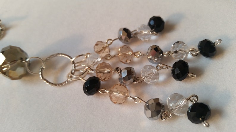 Black stone beaded wire wrapped long necklace with black and clear crystals and silver accents