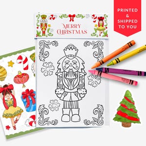 May include: A Christmas-themed coloring set featuring a black and white nutcracker design, a sticker sheet with holiday illustrations, and a small Christmas tree sticker. Includes orange, yellow, purple, and pink crayons. The words "MERRY CHRISTMAS" are printed on the coloring sheet.