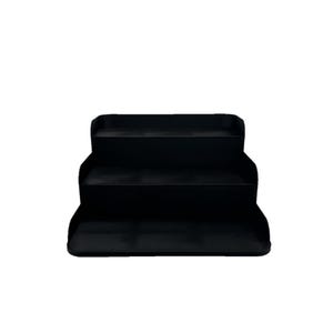 May include: A black three-tiered shelf organizer. The shelf is made of plastic and has a smooth, matte finish.