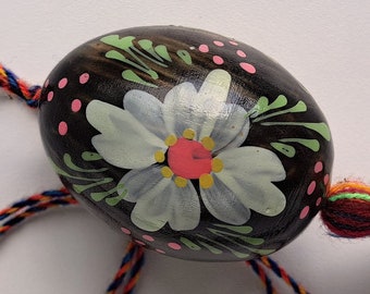 Home decor handmade. Home decoration in the form of an egg with a floral pattern. Painted wooden egg. Easter Egg. Krashenka for Easter