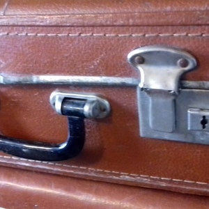 Retro travel medium suitcase made in the USSR in the 1970s. Home decor. Equipment for photo and film shooting