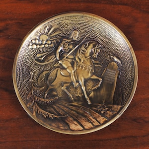 Ancient classical brass mount depicting horseback crusader