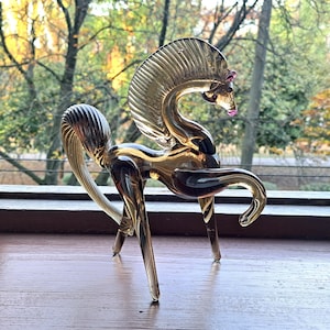 Rare brown colored glass figure of a horse