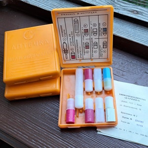 Set of three vintage individual mini first aid kits. New, unused. Great for tourists