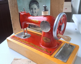 Vintage home decor. In original box children&#39;s metal NOT working mechanical sewing machine. Made in USSR in 1970s
