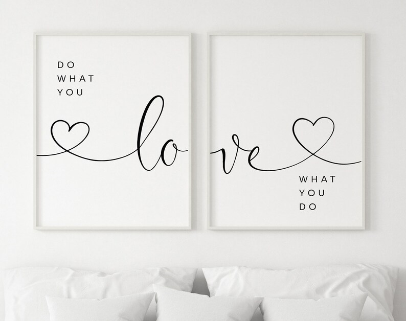 May include: Two framed art prints with white backgrounds. The left print reads "DO WHAT YOU LOVE" in black script and block letters, with a heart-shaped design. The right print reads "LOVE WHAT YOU DO" with a heart design.