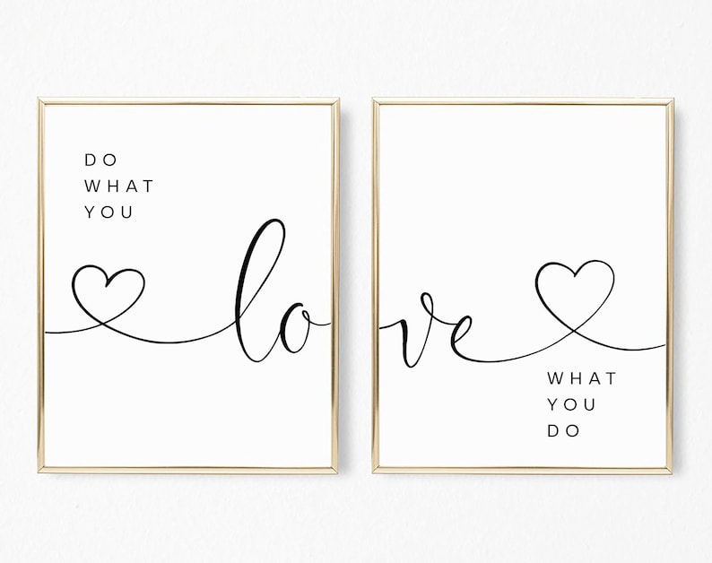 May include: Two framed art prints with gold-colored frames. The prints feature black text and a heart-shaped design on a white background. One print reads "Do what you love," and the other reads "Love what you do."