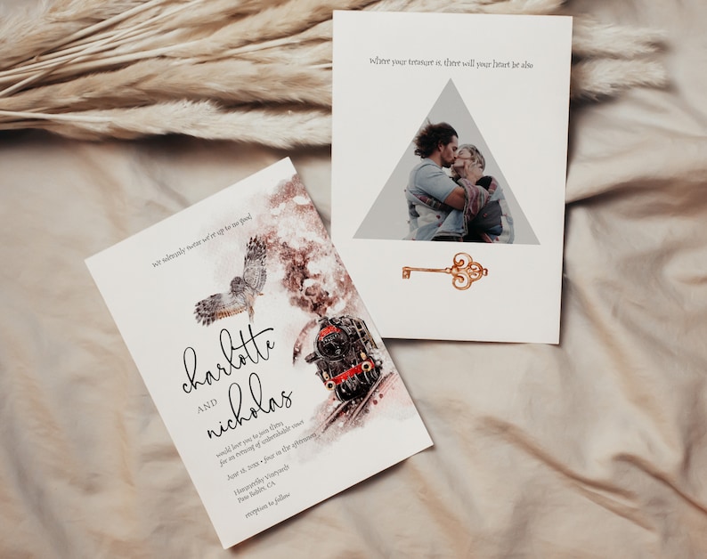 May include: A wedding invitation with a watercolor illustration of a train, an owl, and a key. The invitation is for Charlotte and Nicholas, and it says "where your treasure is, there will your heart be also".
