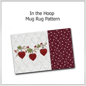 May include: A quilted mug rug with a white background and a burgundy patterned section. The rug features embroidered red hearts hanging from a vine with green leaves and red berries. Text reads "In the Hoop Mug Rug Pattern."
