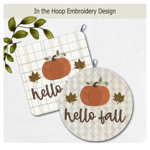 May include: Two fabric pot holders with an In the Hoop Embroidery Design. One square and one round, both feature a beige plaid pattern, an embroidered orange pumpkin, brown leaves, and the text "hello" or "hello fall" in brown script.