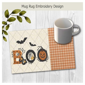 May include: A rectangular mug rug featuring an embroidered Halloween design with the word BOO, two black bats, a spider web, and a jack-o'-lantern. The left side has a cream diamond pattern, while the right side is orange plaid fabric.