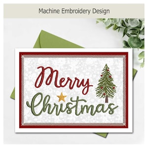 May include: A machine embroidery design featuring the text Merry Christmas in red and green script. A small gold star sits between the words, and a green Christmas tree with red ornaments is on the right. The design has a white snowflake background.