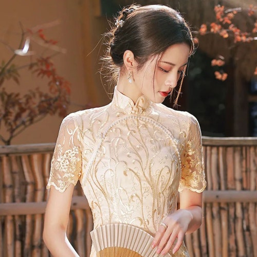 champagne asian dress Beautiful asian woman in a champagne colored dress 70508392 Stock Photo at Vecteezy
