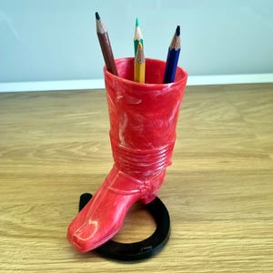 Pencil desk holder - Boot on the horseshoe. Plastic. 1980s
