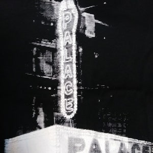 May include: Black and white graphic print of a building with the word "PALER" visible in the bottom right corner.