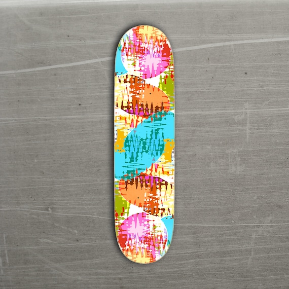It's a Red Pink and Yellow and Blue Digi Distressed Skateboard Deck