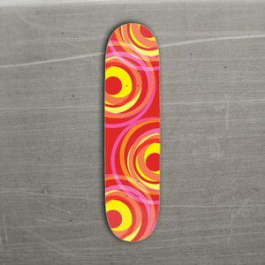 It&#39;s the Red Pink and Yellow Swirl Skateboard Deck