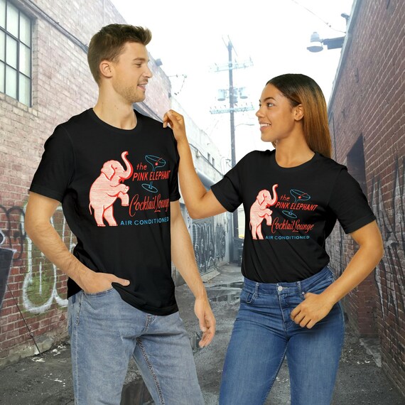 Retro Pink Elephant Cocktail Lounge on a Unisex Bella+Canvas Short Sleeve Tee. Get that Dive Bar vibe going