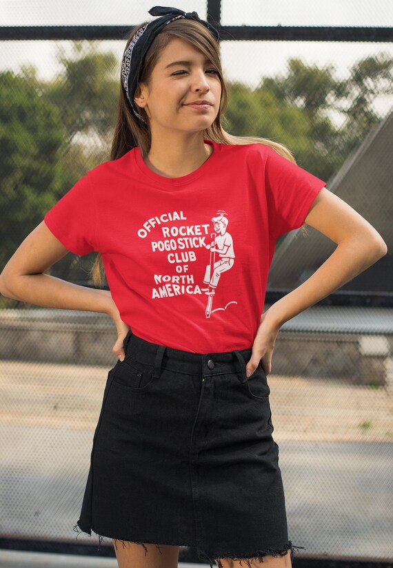 Retro Rocket Pogo Stick Club on a soft Bella+Canvas3001 Unisex Jersey Short Sleeve Tee Shirt