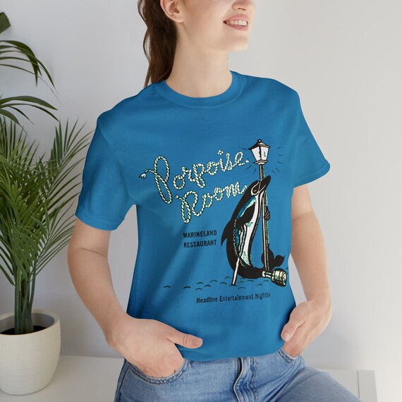 Retro Bar THE PORPOISE ROOM at Marineland on the Pacific on a Unisex Bella+Canvas Short Sleeve Tee.  Mid Century Modern style