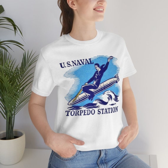 Retro US Naval Torpedo Station drawing on a Bella+Canvas Short Sleeve Tee. A Sailor Riding a Torpedo Perfect Navy gift