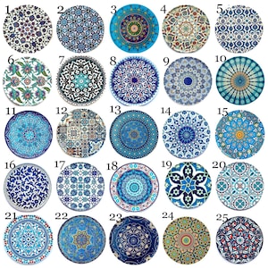 May include: Twenty-five round ceramic plates with intricate blue and white geometric patterns. The plates are numbered 1 through 25.
