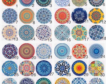 May include: A collection of thirty-six circular ceramic tiles arranged in a grid, each featuring a unique, intricate geometric or floral mandala pattern in a variety of vibrant colors including blue, red, yellow, green, and white.