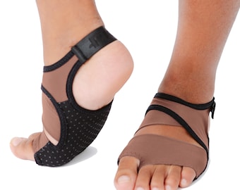 May include: A pair of brown, open-toe foot covers featuring a black elastic strap that wraps around the heel and ankle. The sole area is constructed with a black, textured, non-slip material, while the upper portion is made of smooth brown fabric.