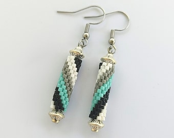 Spiral pastel brick stitch tube dangle earrings with silver spacer bead accent on stainless steel hypoallergenic earring post & rubber back
